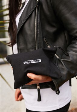 Black SO IMMIGRANT embroidered clutch bag