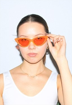 Vintage Y2K iconic cateye sunglasses in neon orange