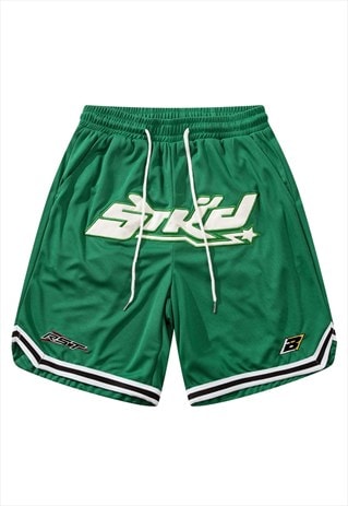 Graffiti patch basketball shorts cropped skater pants green
