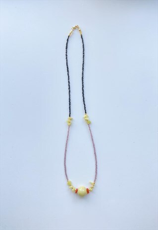 BEADED NECKLACE WITH  CERAMIC CHARM