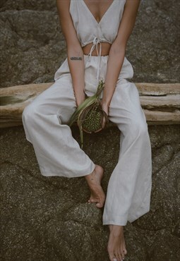 Linen v neck jumpsuit with back cut out and drawstring ties