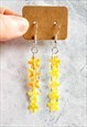 IRIDESCENT FLOWER SEQUIN TRICKLE EARRINGS YELLOW