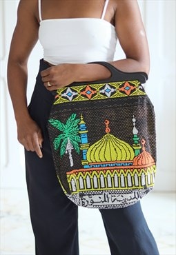 Embroidered pearl handbag