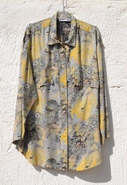 Vintage multi color floral oversized button down shirt.