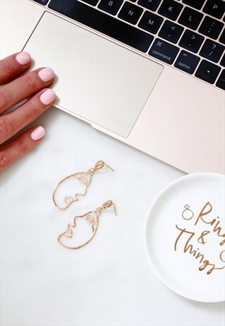 GOLD ABSTRACT PROFILE FACE STATEMENT CUT OUT EARRINGS