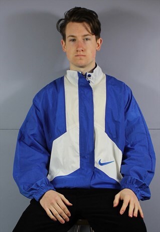 VINTAGE NIKE WINDBREAKER JACKET IN BLUE WITH ZIP POCKETS AND
