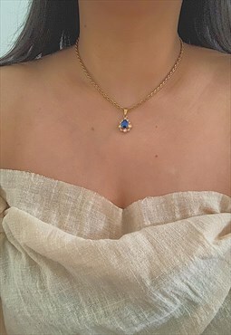 DUCHESS. Blue Teardrop Crystal Pendant Gold Rope Necklace