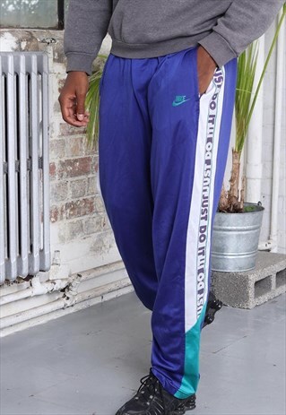 VINTAGE NIKE TAPE LOGO TRACKSUIT TROUSERS PURPLE