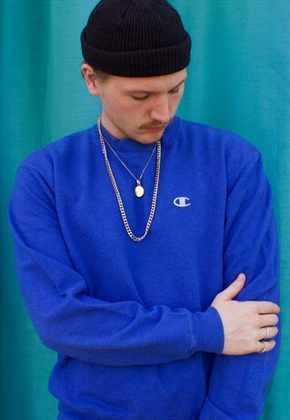 VINTAGE BLUE CHAMPION SWEATSHIRT.