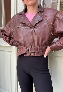 Vintage 80s brown leather biker jacket with decorative jets 