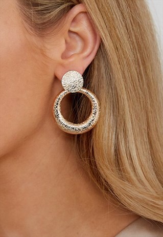 GOLD STATEMENT EARRINGS