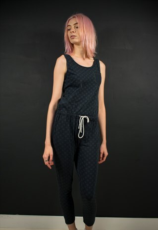 NAVY POLKA DOT JUMPSUIT
