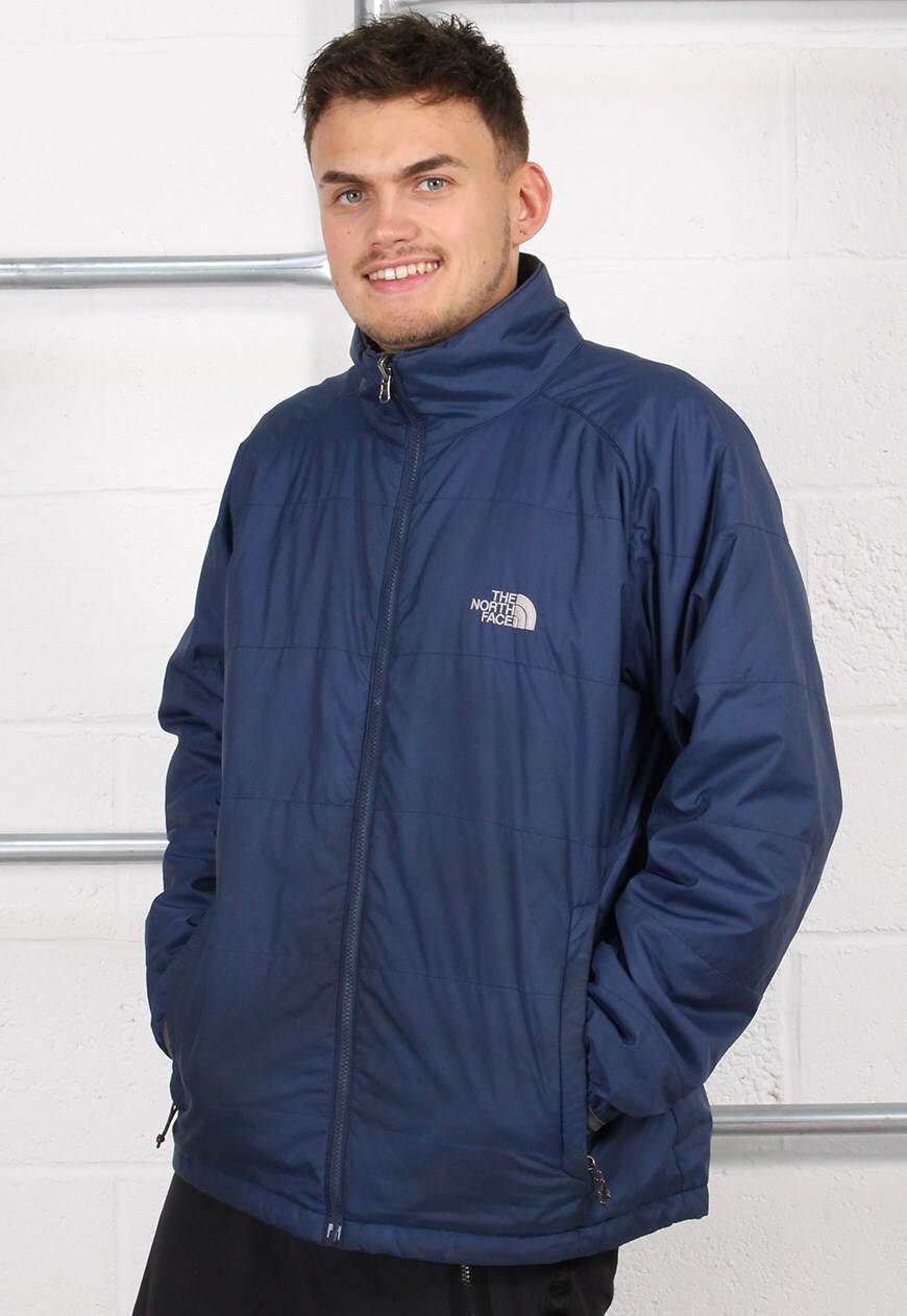 navy blue north face windbreaker