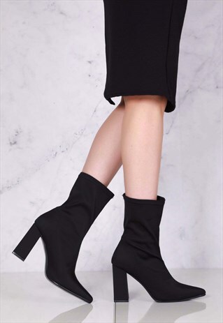 BLOCKHEEL SLIP 0N ANKLEBOOT IN BLACK LYCRA