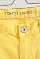 VINTAGE 00S TOMMY HILFIGER JEANS IN YELLOW 