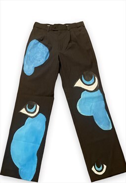 Grey suit pants with abstract eye print 