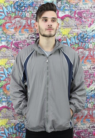 VINTAGE 90S SHELL JACKET / WINDBREAKER. UNISEX SPORTSWEAR.