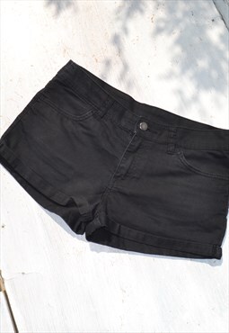 Vintage black thin denim mid rise stretch shorts.