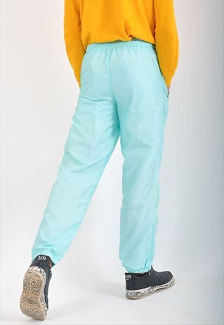 VINTAGE HEAD SHELL TRACK JOGGERS IN LIGHT GREEN