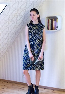 Blue sleeveless vintage dress with bright  patterns
