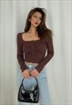 BROWN FRONT RUFFLED LONG SLEEVE TOP