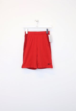 Vintage Nike shorts in red. Best fits M