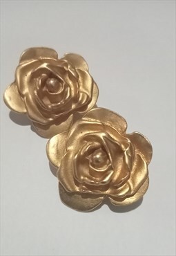 Gold tone rose clip on earrings