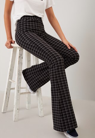 CHECKED FLARED TROUSERS