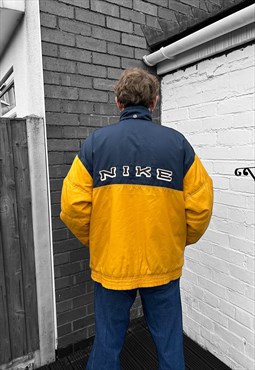 Vintage Nike 1990s yellow and navy puffer jacket coat 