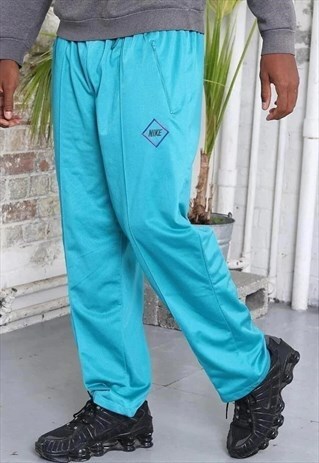 turquoise tracksuit
