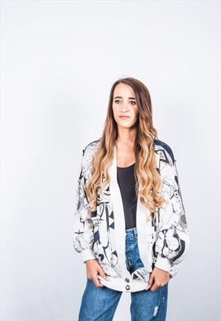 VINTAGE 1980S FESTIVAL WHITE AND BLACK BOMBER JACKET