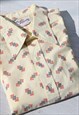 Vintage cream printed short sleeved long button down shirt