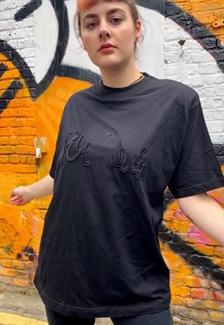 VINTAGE 90S T-SHIRT IN BLACK WITH PULL ME OVER DETAIL