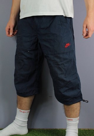 VINTAGE NIKE 3/4 LENGTH SHORTS IN NAVY BLUE WITH POCKETS, EM