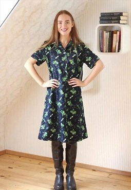 Navy blue shirt style dress with green flowers
