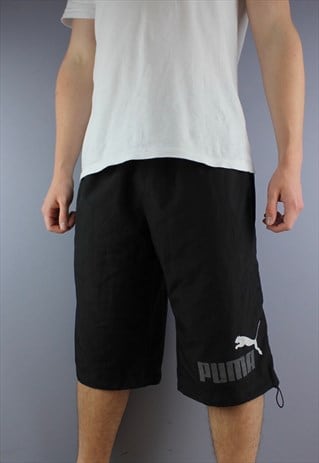 VINTAGE PUMA SHORTS IN BLACK WITH PRINTING AND POCKETS. HAS