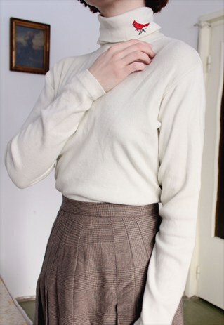 IVORY COTTON TURTLENECK TOP WITH BIRD DETAIL