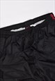 VINTAGE 90S NIKE EMBROIDERED LOGO TECH JOGGERS IN BLACK