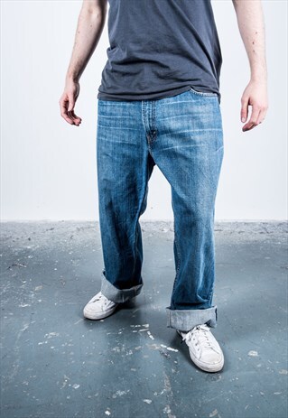 VINTAGE BLUE LEVI'S 569 RIPPED JEANS