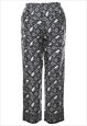 VINTAGE LIZ CLAIBORNE BLACK & WHITE ELEPHANT PRINT TROUSERS 