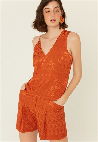 PATTERN BLOUSE WITH AN ASYMMETRIC SHOULDERS
