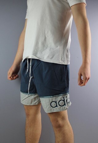 VINTAGE ADIDAS SHORTS IN NAVY WITH POCKETS, PRINTED LOGO AND