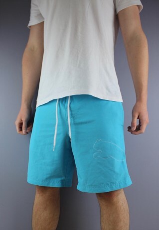 VINTAGE PUMA SHORTS IN BLUE WITH POCKETS AND PRINTED LOGO. H