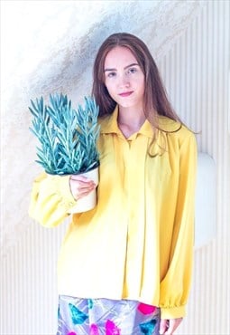 Bright yellow long sleeve silky shirt blouse