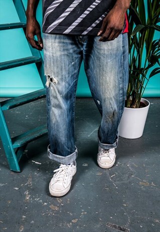 VINTAGE LEVI'S 501 JEANS IN BLUE WITH RIPS AND PAINT MARKS