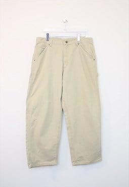 Vintage Lee carpenter trousers in beige. Best fits W36