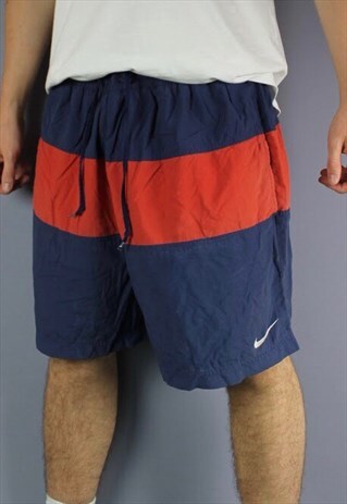 VINTAGE NIKE SHORTS IN NAVY WITH POCKETS, PRINTED LOGO AND D