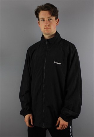 VINTAGE REEBOK SHELL WINDBREAKER IN BLACK WITH EMBROIDERED L
