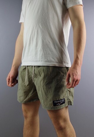VINTAGE REEBOK SHORTS IN BROWN WITH POCKETS, PATCH LOGO AND