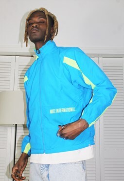 Vintage 90s Blue Nike International Track Jacket